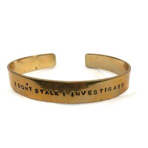 "I Don't Stalk I Investigate" Gold Tone Cuff Bangle 2.5" Diameter